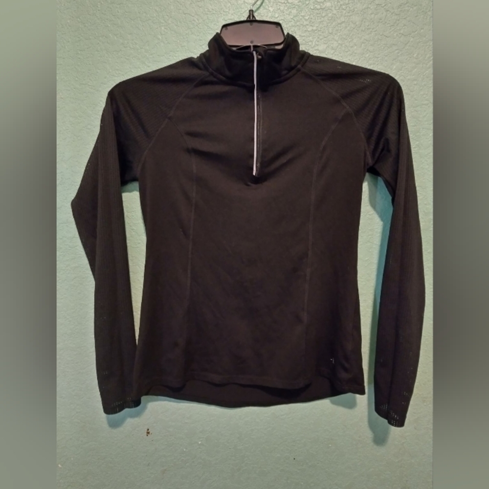 It is a black Danskin blouse from Zara xs long sleeve